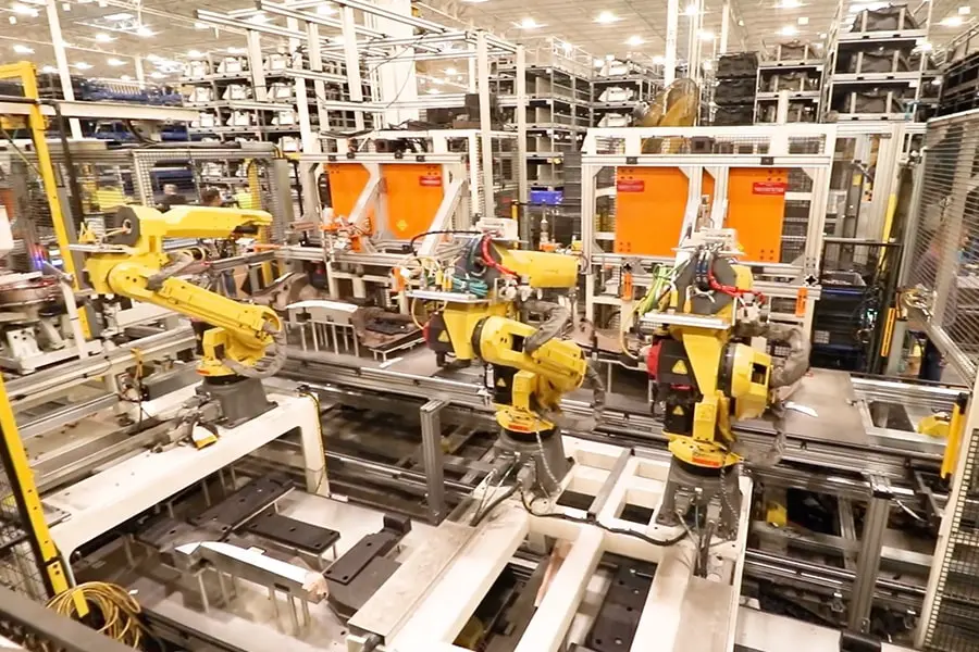 Vision for automotive assembly tasks by robots, where parts are put together using AI.