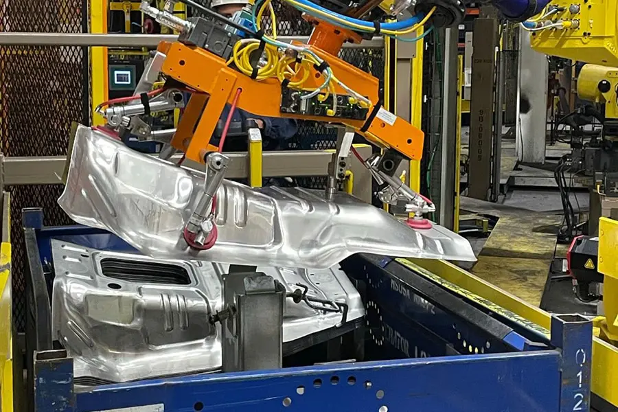 Vision system that guides a robot to find objects in an automotive factory.