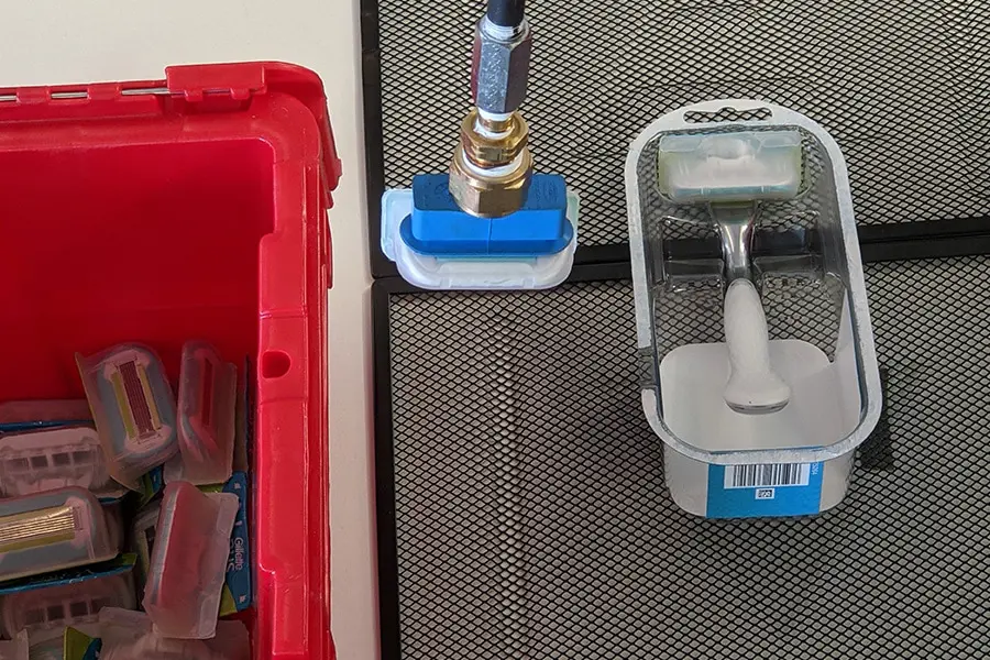 UR robot being used for consumer packaged goods packaging application